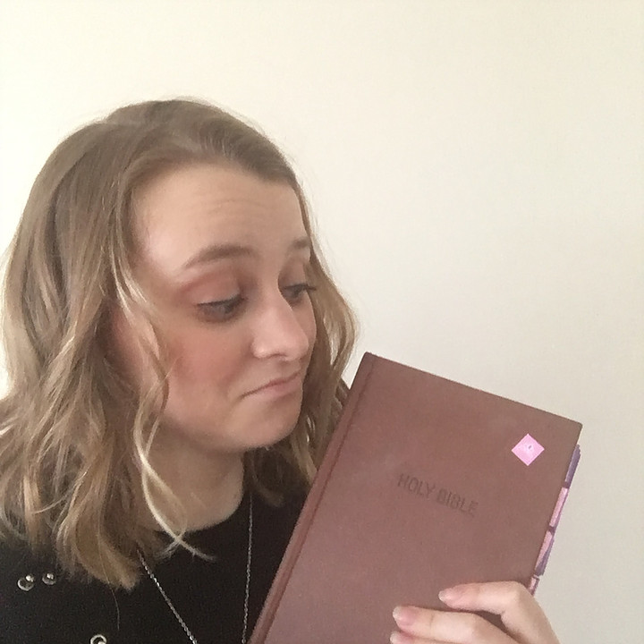 Michelle looking at her cheap Wal-Mart bible 