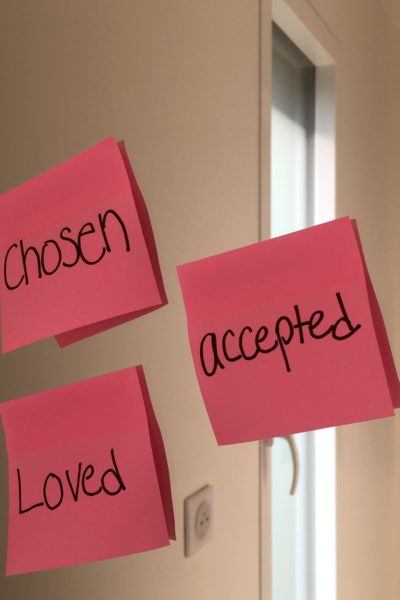 The notes Chosen Loved and Accepted on the bathroom mirror