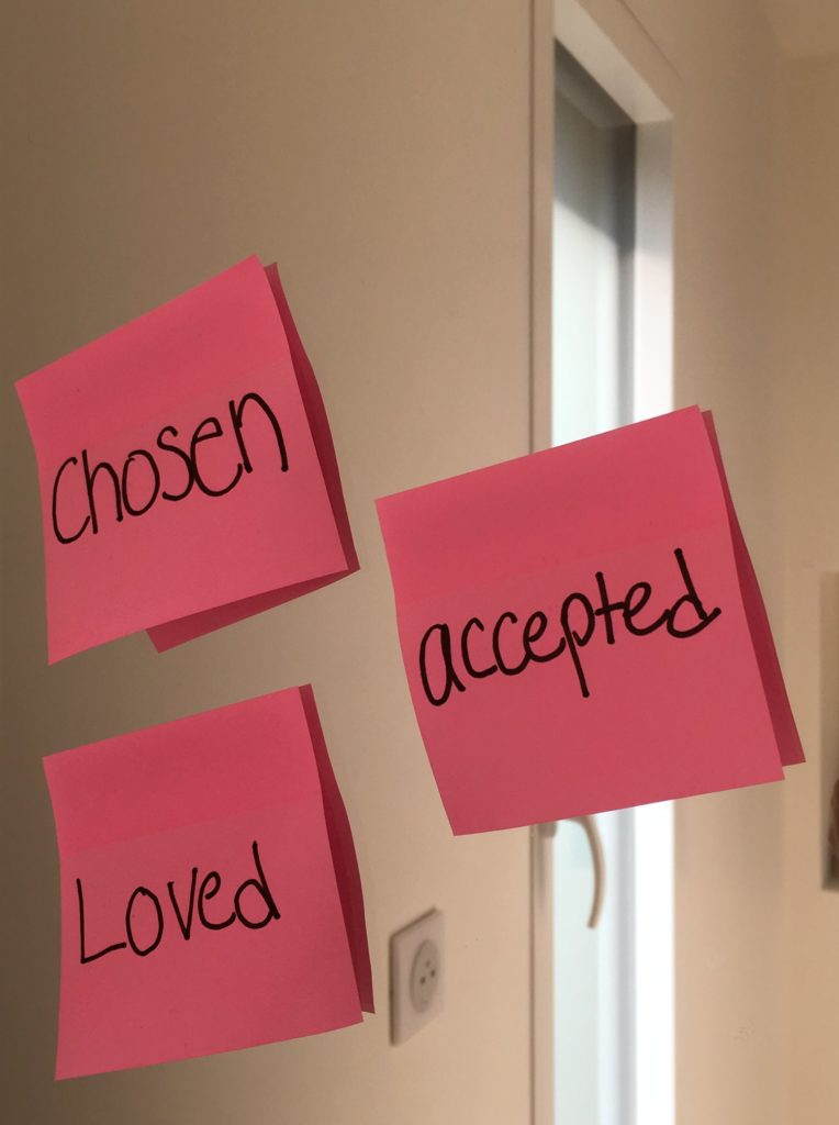 The notes Chosen Loved and Accepted on the bathroom mirror